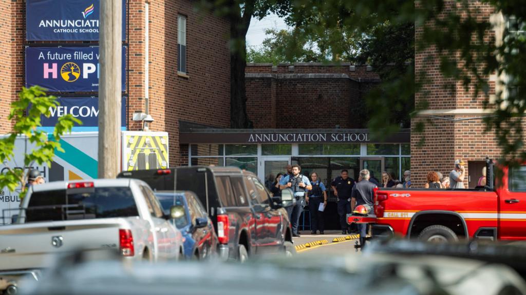 Students and first responders outside Annunciation Catholic School in Minneapolis after mass shooting on August 27, 2025