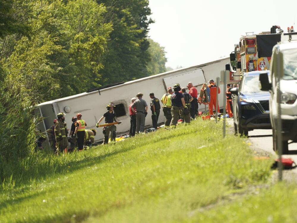 Emergency responders at the scene of the New York tour bus crash on Interstate 90 near Pembroke