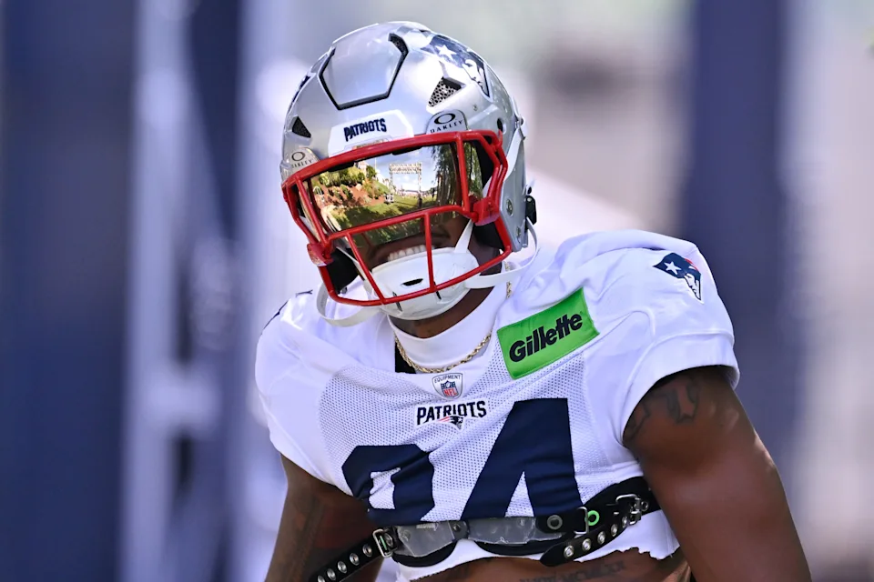Kendrick Bourne during a game, looking focused in Patriots uniform.