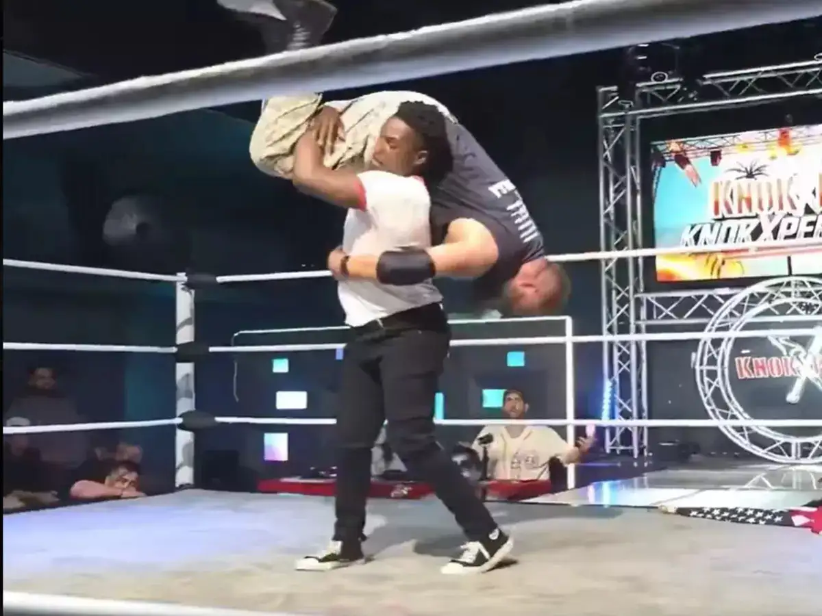 Raja Jackson delivers a series of real punches to wrestler Syko Stu during Knokx Pro Wrestling event.